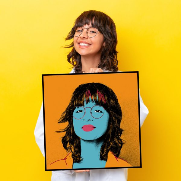 Young doctor latin woman isolated on yellow background holding an empty placard with happy expression Young doctor latin woman isolated on yellow background holding an empty placard with happy expression